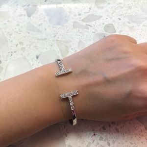 Gold diamond T  bracelet